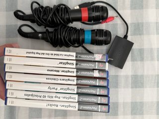SingStar PS2 + 2 Micrófonos + 7 Juegos
