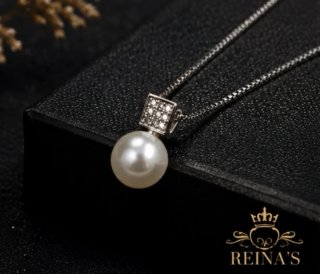 Conjunto bisutería collar y pendientes perla