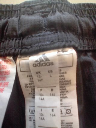 Pantaloncini Adidas neri con zip