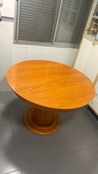 Mesa de comedor redonda de madera expansible