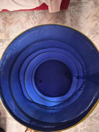 Cesta guarda juguetes azul y amarilla