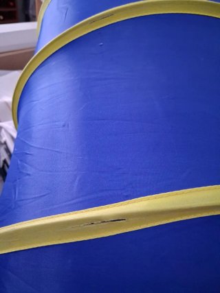 Cesta guarda juguetes azul y amarilla