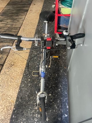 Bicicleta plegable plateada