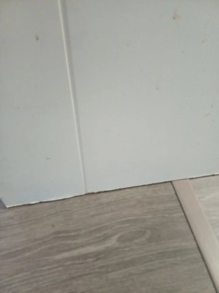 Puerta blanca lacada con pomo