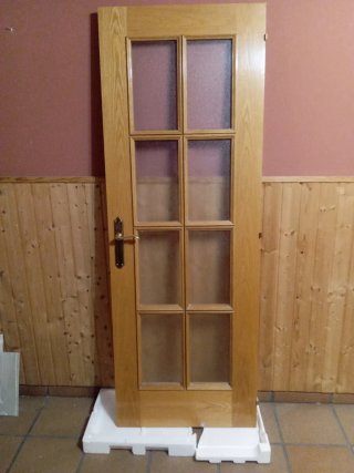Puerta madera maciza con cristales