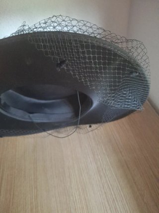 Tocado vintage negro con velo