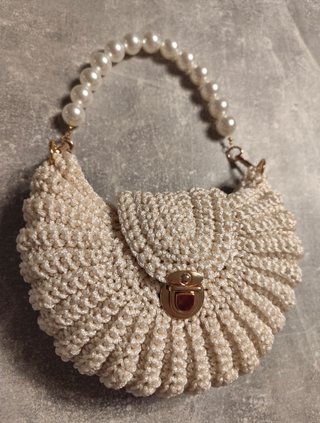 Bolso de mano tejido hecho a mano