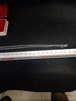 Cadena de plata antigua con flor