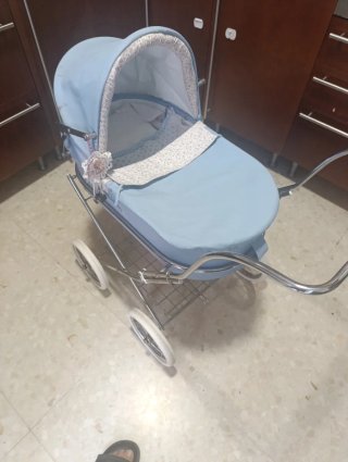 Cochecito de juguete para muñecas