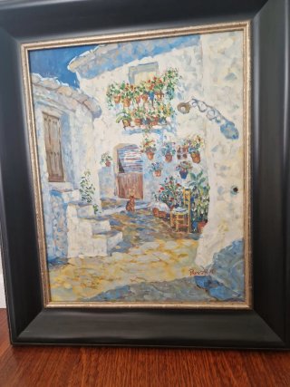 Pintura al óleo de pueblo con marco