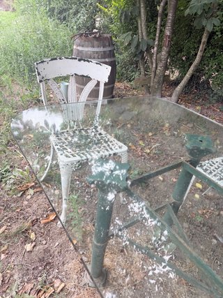 Tavolo da giardino in vetro e metallo