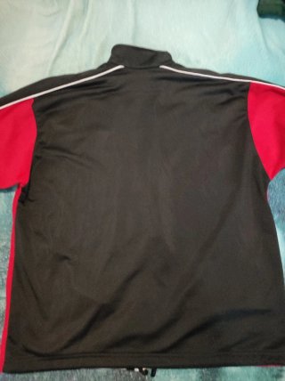 Chaqueta deportiva Reebok roja y blanca