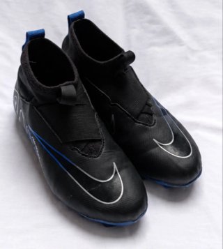 Botas de fútbol Nike niño negras y azules