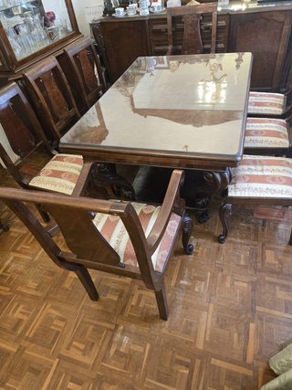 Mesa extensible de madera y cristal