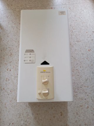 Calentador Cointra Gas Natural + tubo salida gases