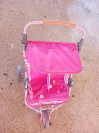 Carrito de muñecas gemelar rosa