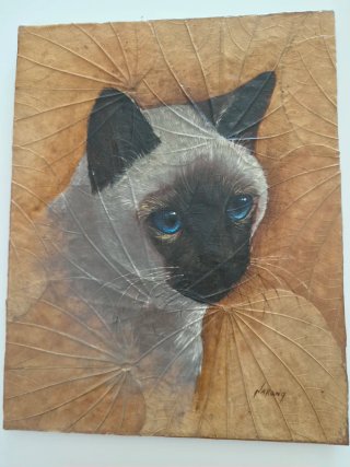 Pareja Gatos Siameses sobre Hojas