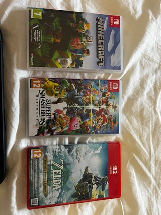 Nintendo Switch OLED Negra + Juegos