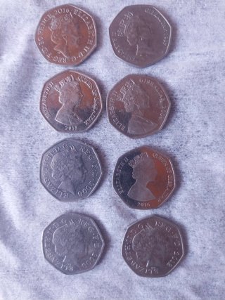Lote 8 monedas 50 pence conmemorativas