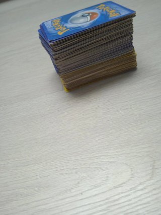 Taco de cartas y cinco super raras