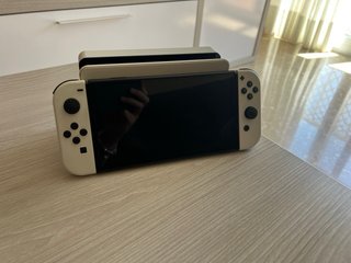 Nintendo Switch OLED + Caja + 2 juegos
