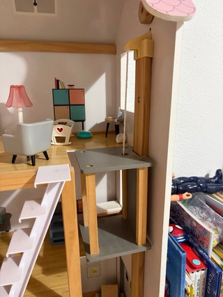 Casa de muñecas de madera con accesorios