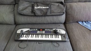 Piano Electrónico con Micrófono y Funda