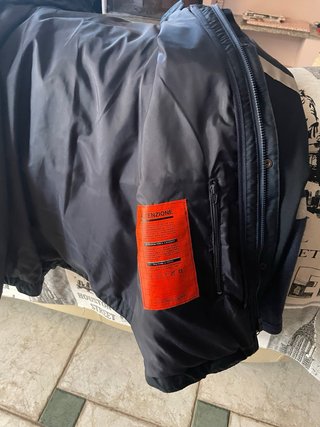 Giubbino uomo nero con bande riflettenti