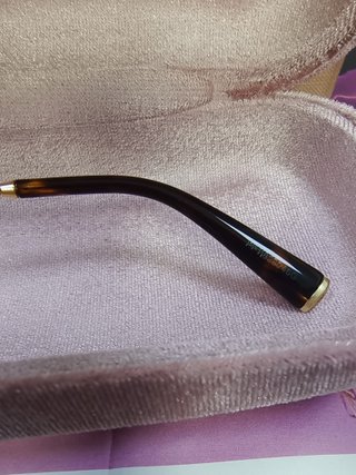 Gafas de sol Miu Miu ovaladas doradas