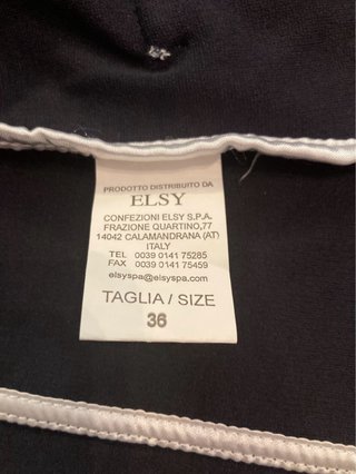 Americana azul marino con ribetes blancos Elsy