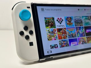 COMO NUEVA Nintendo Switch OLED +  20 Juegos