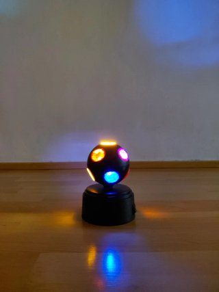 Lámpara LED giratoria para fiestas