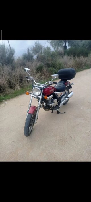 SE ACEPTA CAMBIO Daelim VT Evolution 125cc 2001