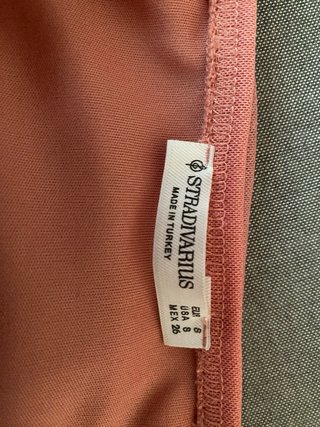 Vestido rosa sin tirantes con volantes Talla S