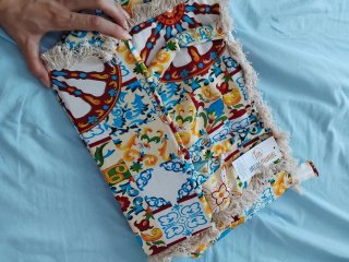 Bolso de mano estampado con flecos