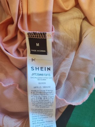 Vestito rosa lungo con stampa floreale
