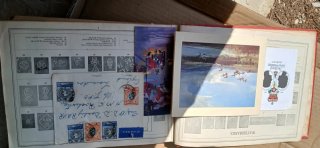Improved stamp album
