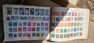 Improved stamp album
