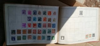 Improved stamp album