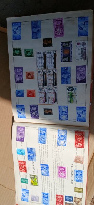Improved stamp album