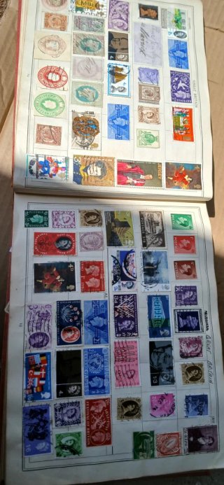 Improved stamp album
