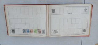 Improved stamp album