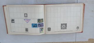 Improved stamp album