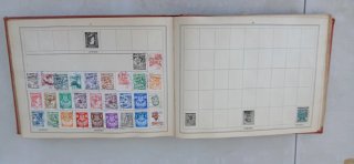 Improved stamp album