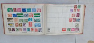 Improved stamp album