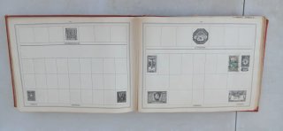 Improved stamp album