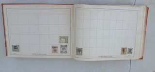 Improved stamp album