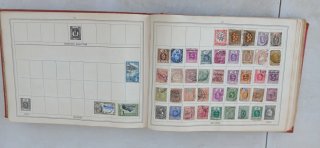 Improved stamp album