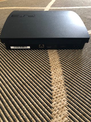 PS3 Slim Negra - Lector de discos no funciona.