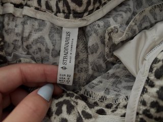 Pantalones de lino con estampado de leopardo